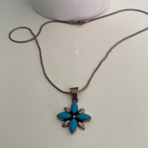 Silver flower pendant